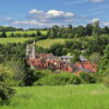 Looking down on the rooftops of Amersham Old Town in the English Chiltern Hills in Buckinghamshire, with Church Tower and rolling countryside