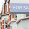 For Sale signs displayed outside terraced houses in Harringay, London