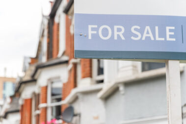 For Sale signs displayed outside terraced houses in Harringay, London