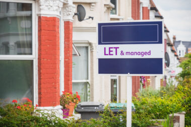 Estate agent sign displayed outside a terraced house in Harringay, London to let rent buy-to-let rental